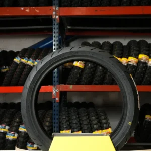 GOMA DUNLOP DE CALLE · DELANTERA